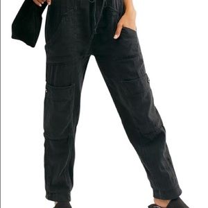 Black relaxed fit cargo pants from Free People